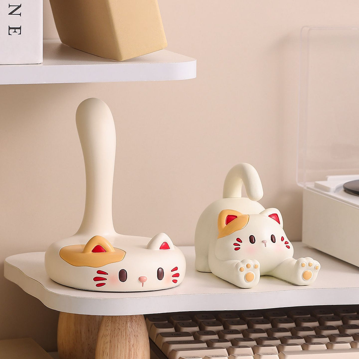 A + B set: two cat resin desk phone stands