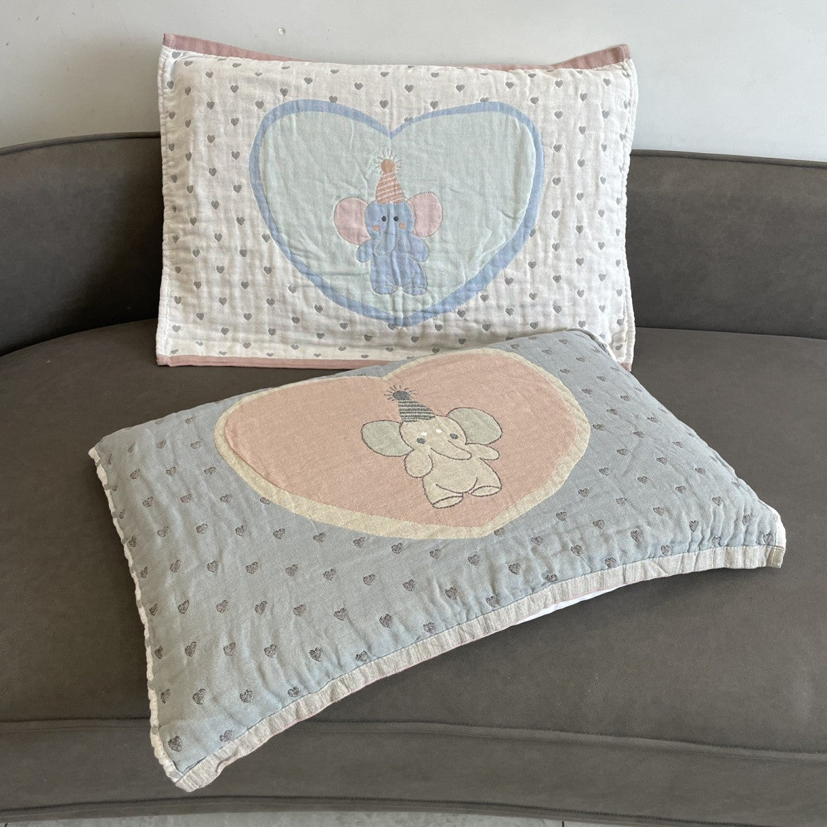 Front and reverse patterns of the heart elephant pillow towel.