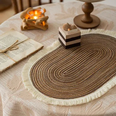 Coffee brown oval placemat, overhead view