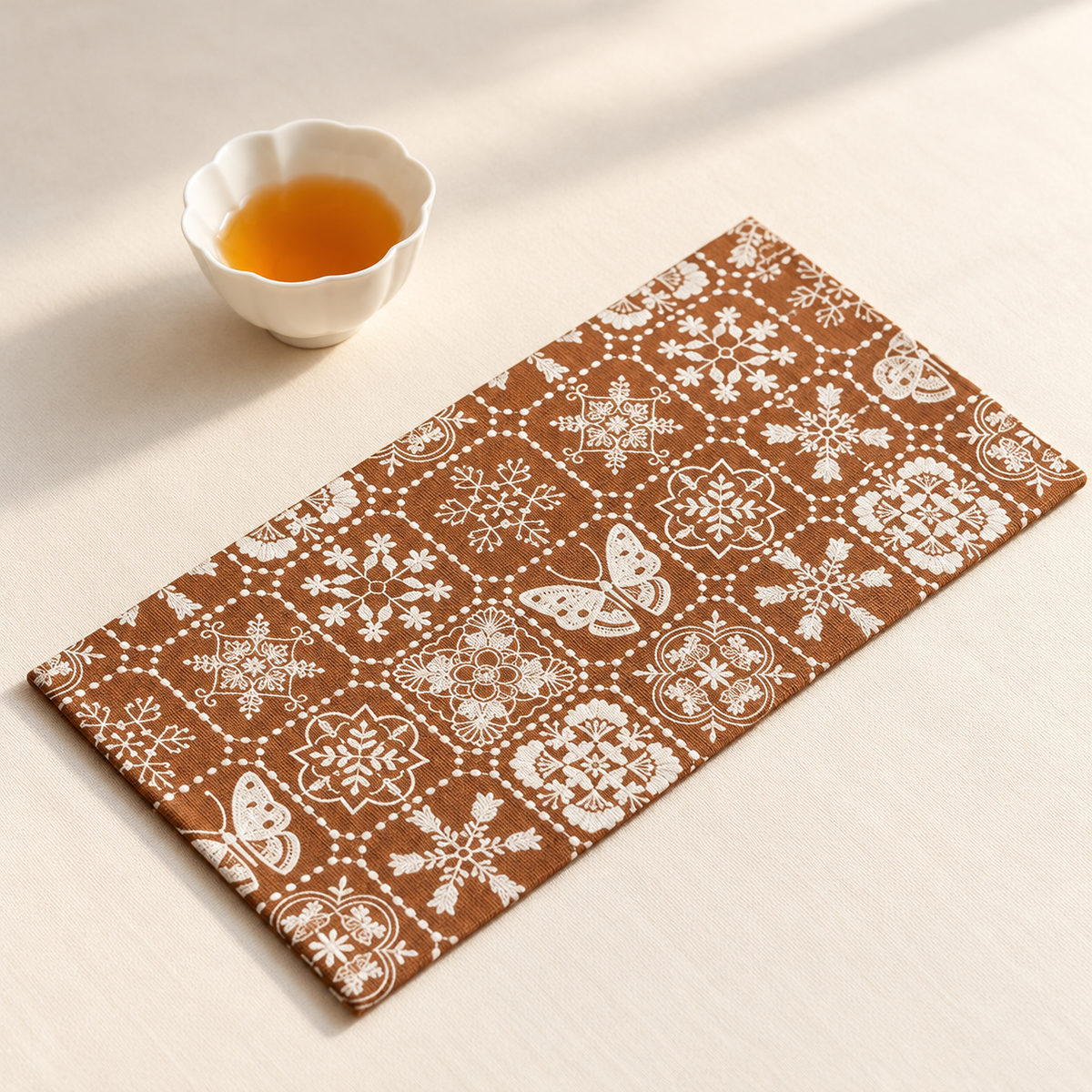 Brown sashiko-style patterned cotton-linen embroidered top tea mat