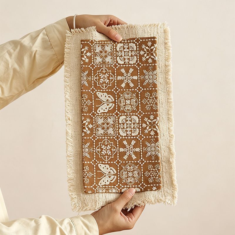 Layered dry tea mat with patterned top and fringed base